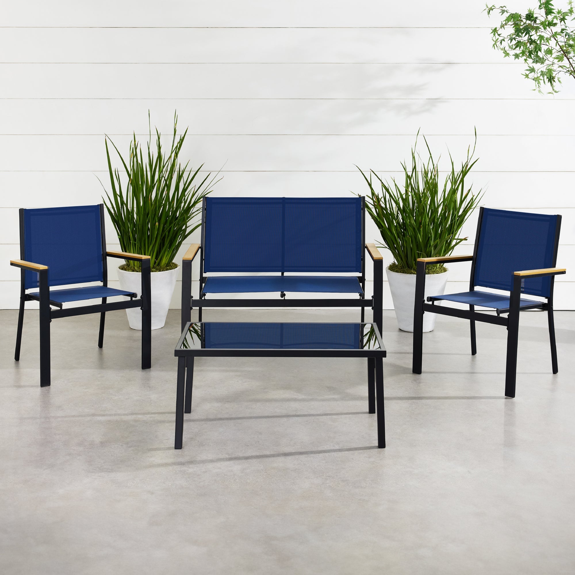 4-Piece Textilene Outdoor Conversation Set with Cushions Table designed for patio and backyard use